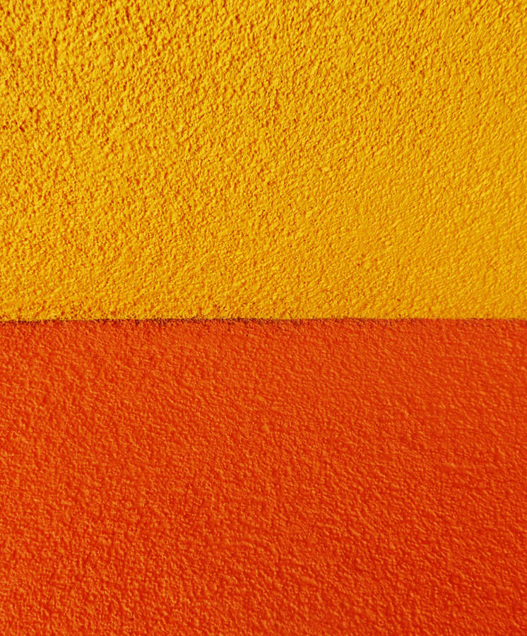 Textured Orange And Yellow Concrete Wallpaper