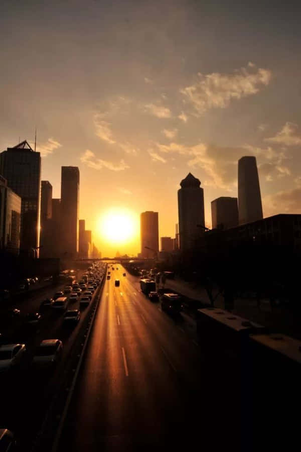 The Beauty Of The City Skyline At Sunset Wallpaper