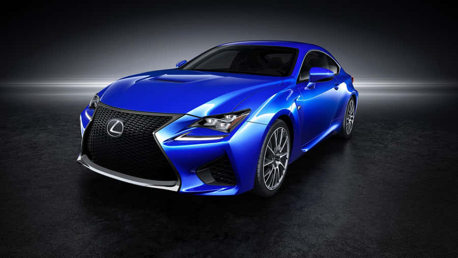 The Blue Lexus Rc Is Shown In A Dark Background Wallpaper