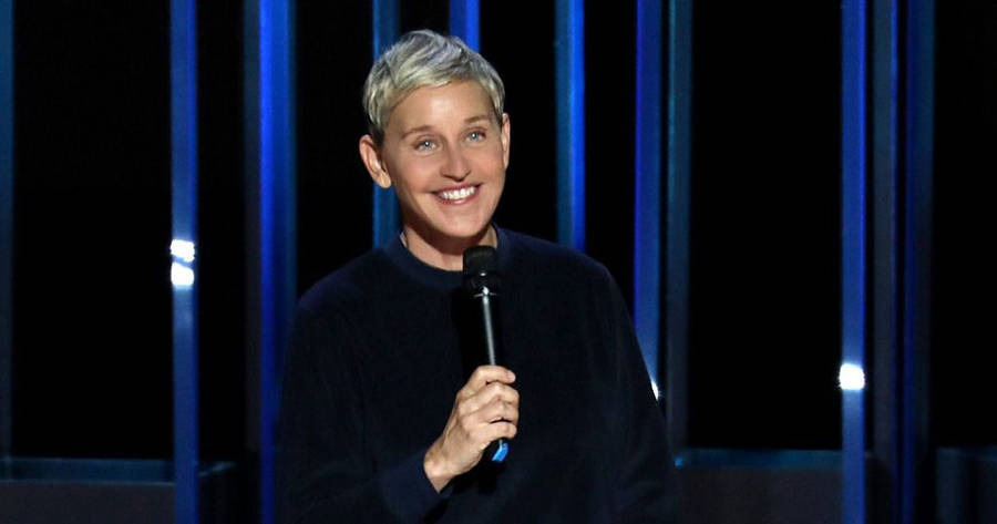 The Ellen Show Host Holding Mic Wallpaper