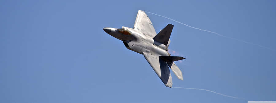 The F-22 Raptor, America's Premier Fighter Jet Wallpaper