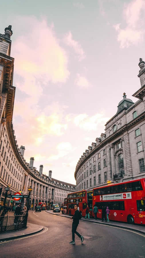 The Iconic Skyline Of London Showcased On An Iphone Device Wallpaper