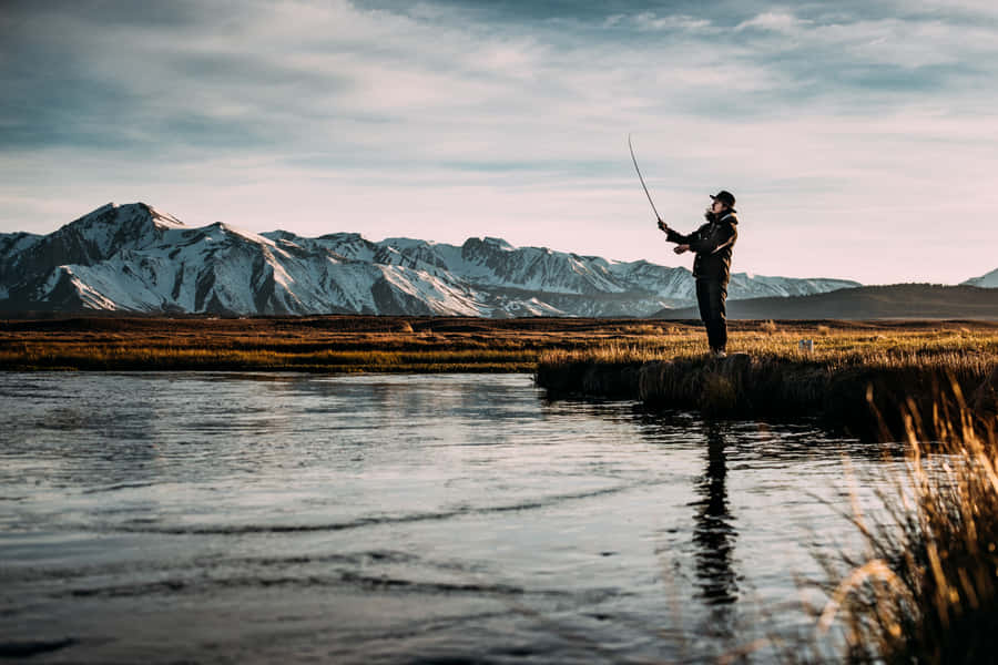 The Joy Of Fly Fishing In Nature Wallpaper