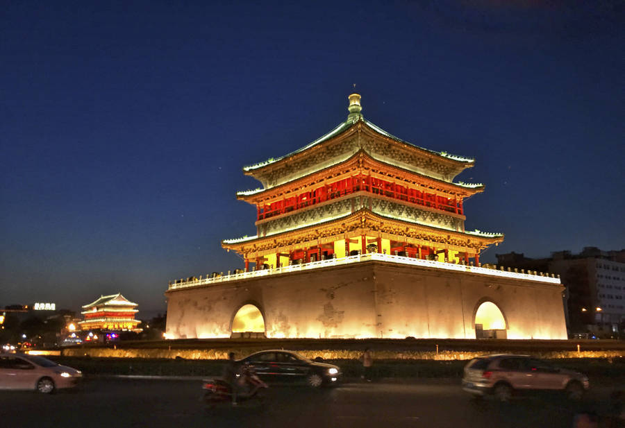 The Majestic Bell Tower Of Xi'an At Dusk Wallpaper