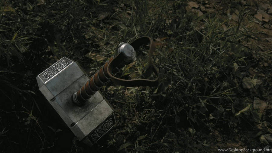 The Mighty Thor Unsheathing Mjolnir Wallpaper