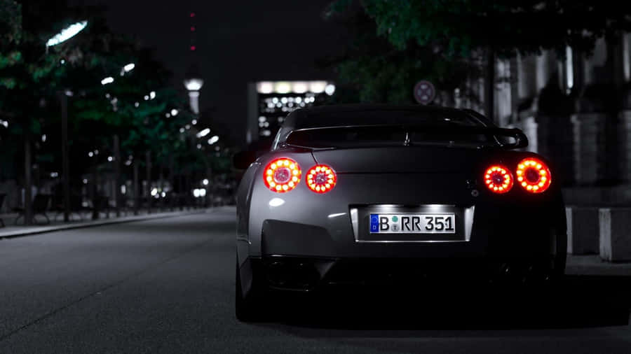 The Power And Speed Of Xtreme: Nissan Gtr R35 Wallpaper