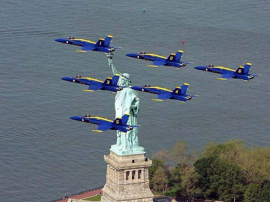 The Statue Of Liberty Is In The Water Wallpaper