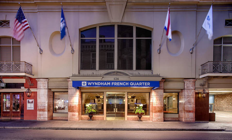 The Vibrant Wyndham French Quarter Hotel In New Orleans Wallpaper