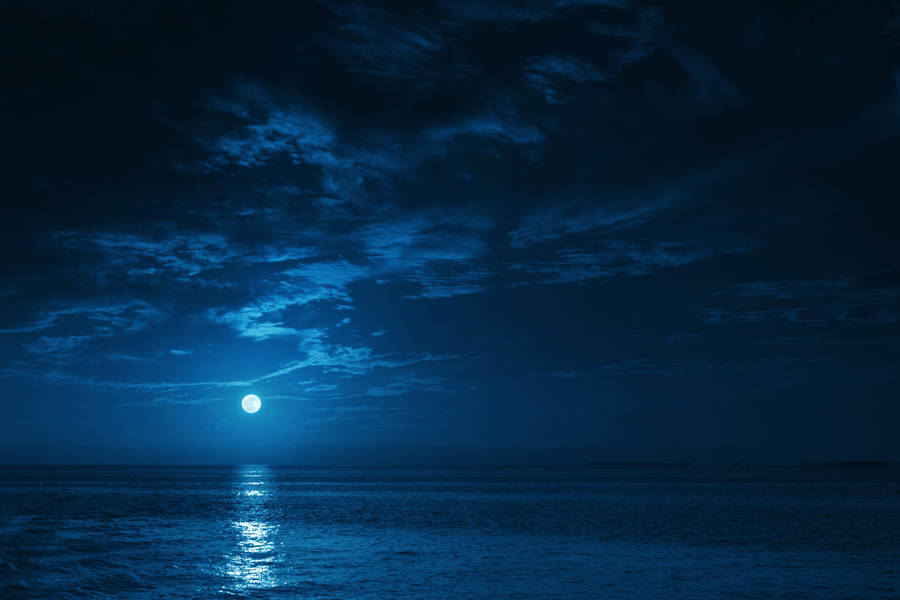 The Vivid Enchantment Of A Full Moon Night Wallpaper