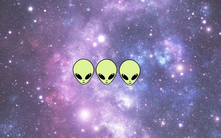Three Aliens In Space With A Purple Background Wallpaper