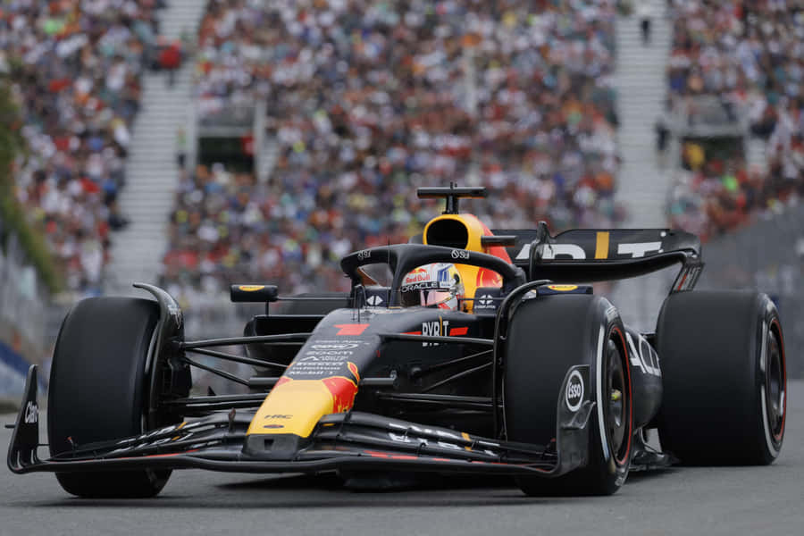 Thrilling Formula 1 Race In Action Wallpaper