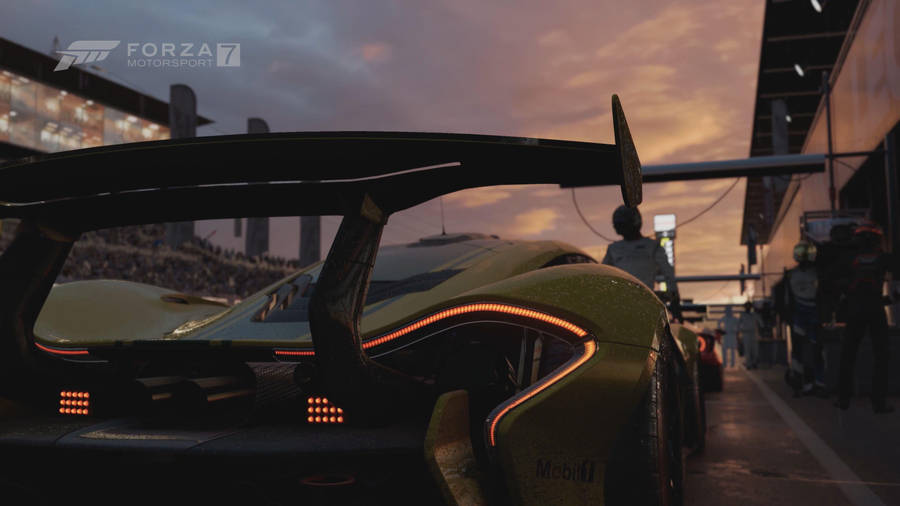 Thrilling Race In Forza Motorsport 7 With Yellow Green Race Car Wallpaper