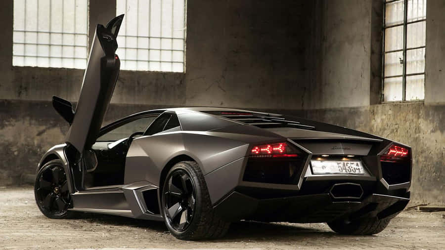 Thunderous Speed - High-speed Luxury Car Wallpaper