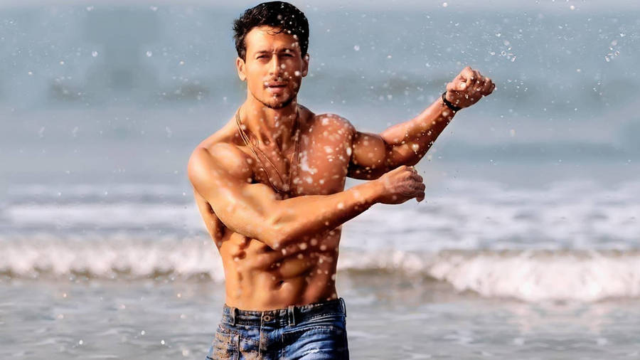 Tiger Shroff's Body At The Beach Wallpaper