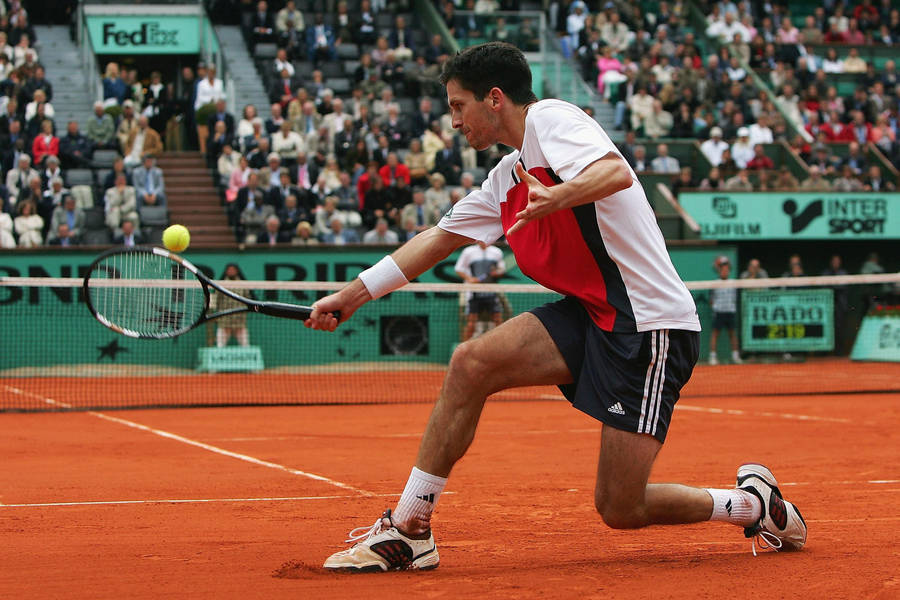 Tim Henman Reaching Ball Wallpaper