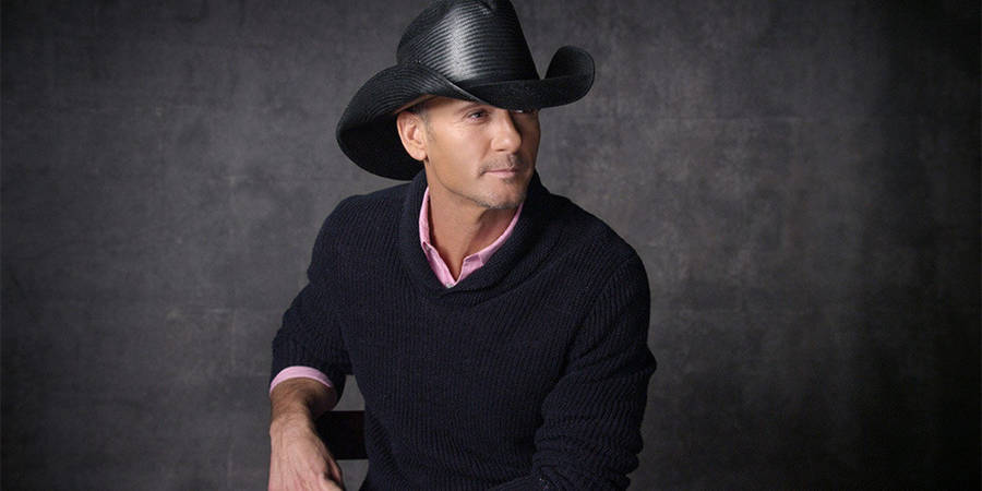 Tim Mcgraw Cowboy Hat Limewash Wall Wallpaper