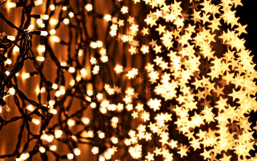 Tiny Gold Star Christmas Lights Wallpaper