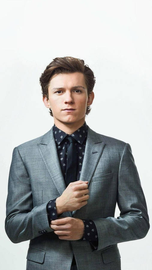 Tom Holland In Gray Suit Wallpaper