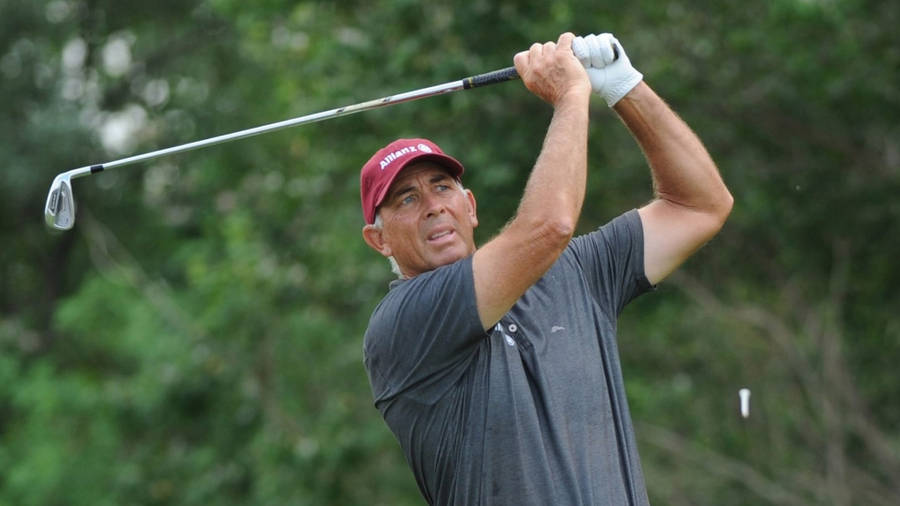 Tom Lehman Swinging A Golf Club Wallpaper