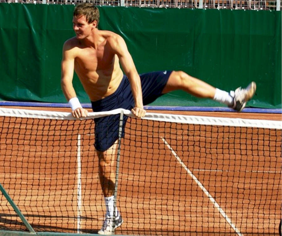 Tomas Berdych Masterful Mid-game Net-crossing Moment Wallpaper