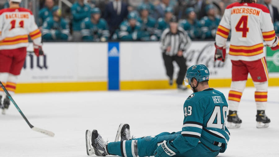 Tomas Hertl Sitting On The Rink Wallpaper