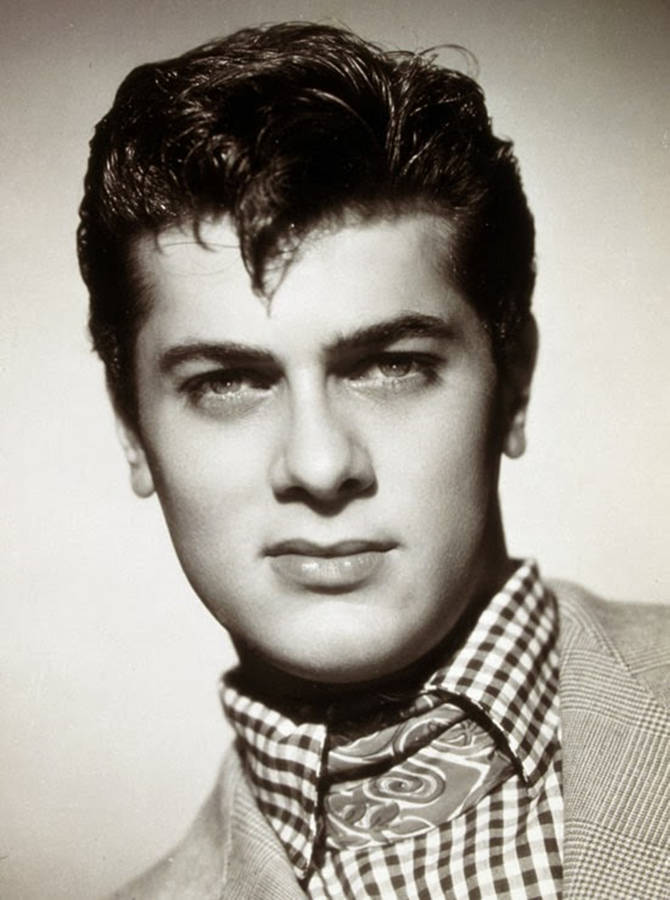 Tony Curtis In Classic Checkered Attire Wallpaper