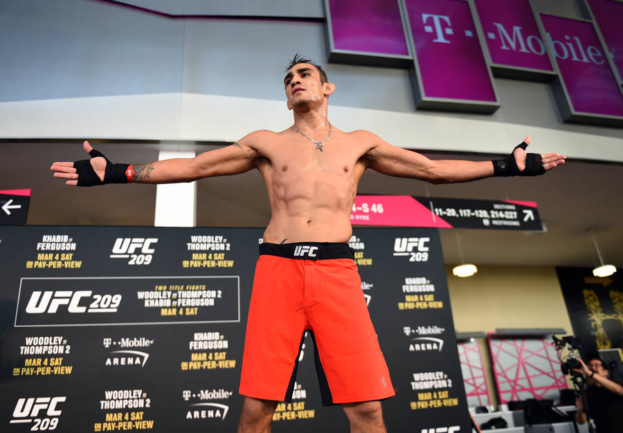 Tony Ferguson In Orange Shorts Wallpaper