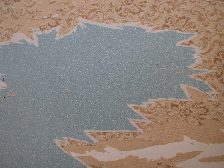 Torn Paper On Blue Wall Wallpaper