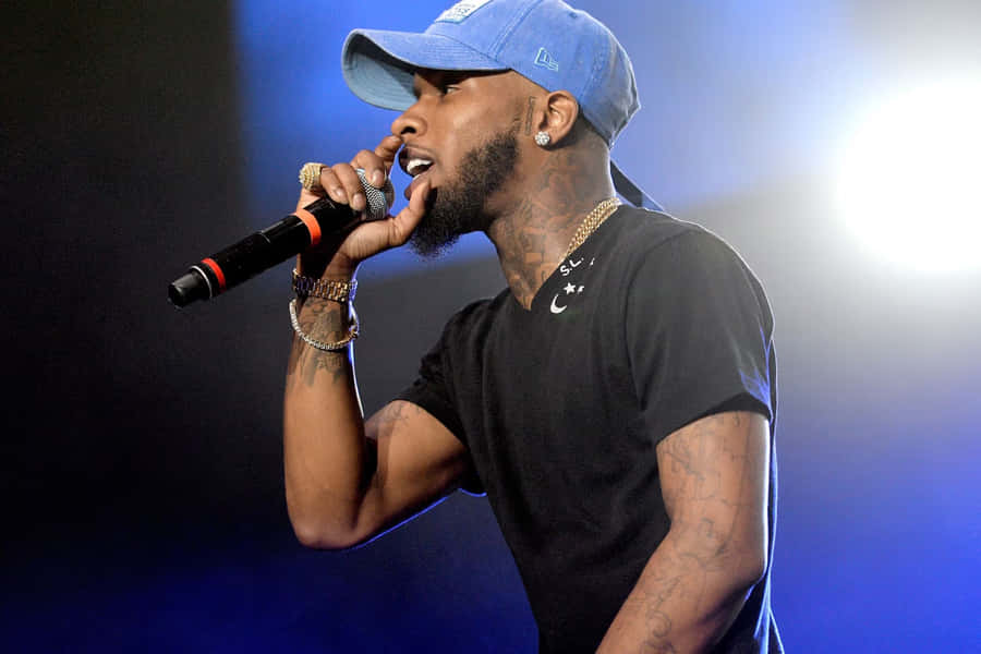 Tory Lanez Performing Liveon Stage Wallpaper