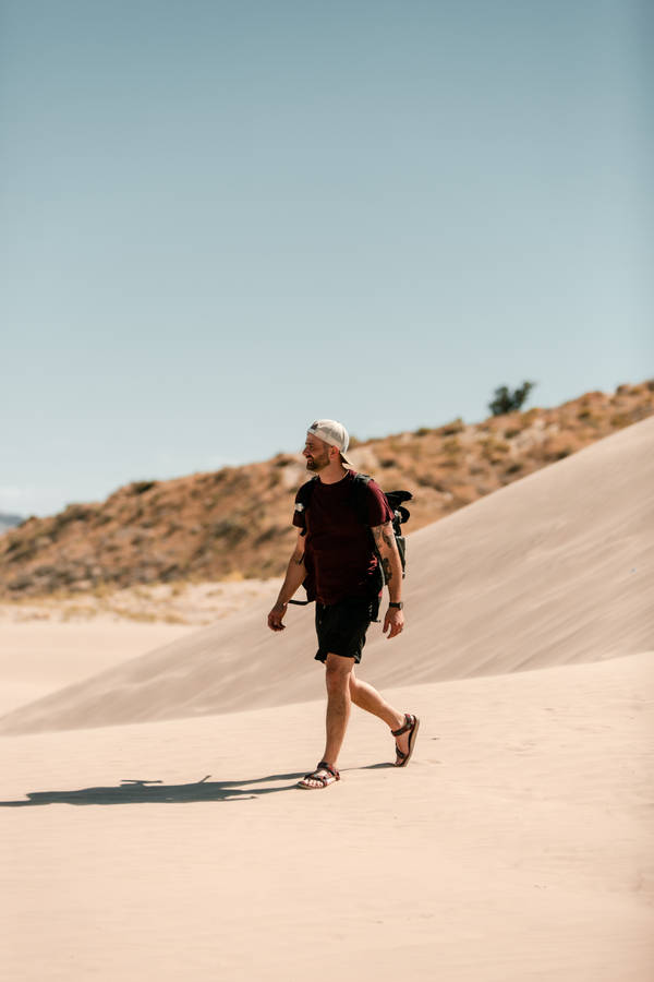 Tourist In The Sahara Wallpaper