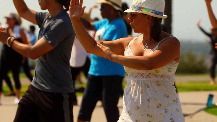 Tourists Doing Tai Chi Wallpaper