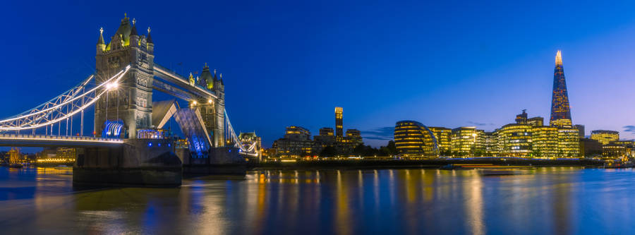 Tower Bridge And Buildings At Night Wallpaper