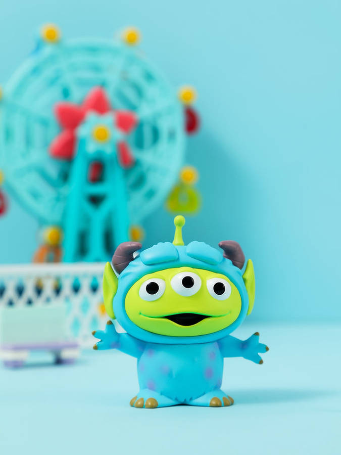 Toy Story Alien Against Ferris Wheel Wallpaper