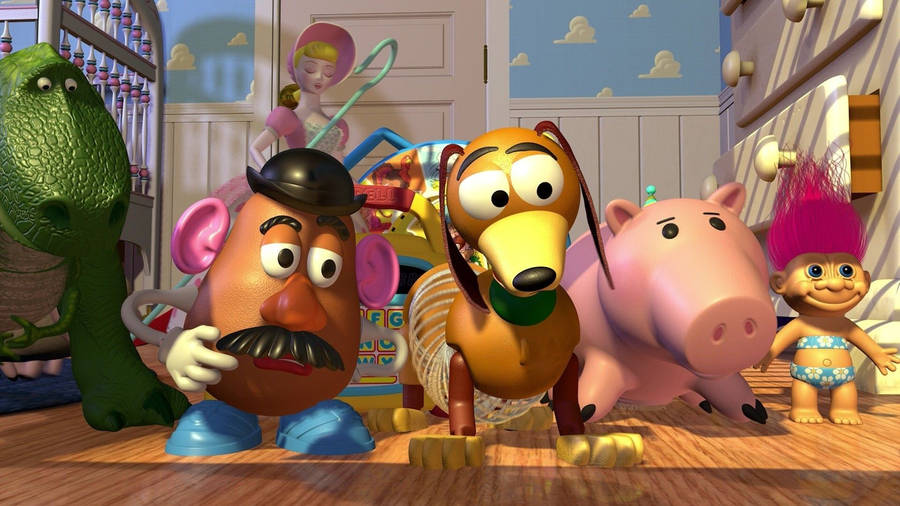 Toy Story Rex Beside Friends Wallpaper