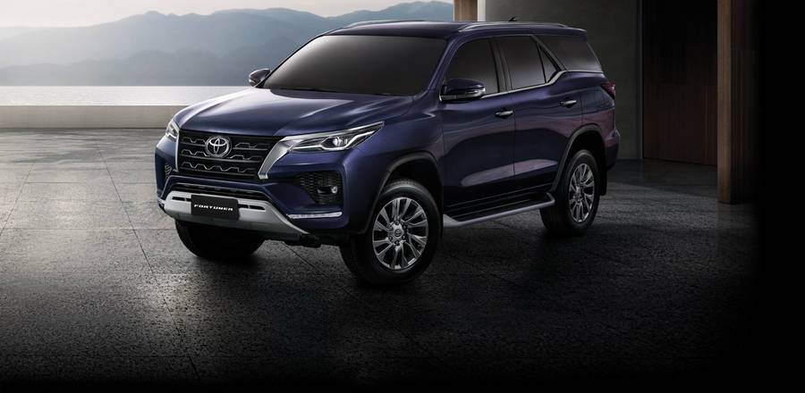 Toyota Fortuner In Metallic Blue Color Wallpaper