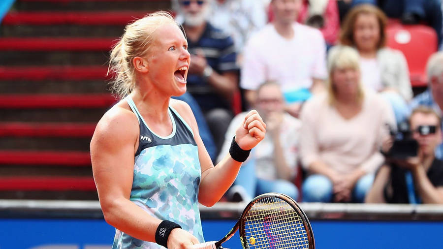 Triumph Overcome - Kiki Bertens Celebrating With A Fist Pump Wallpaper