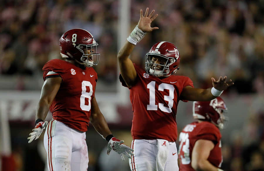 Tua Tagovailoa High Five Wallpaper