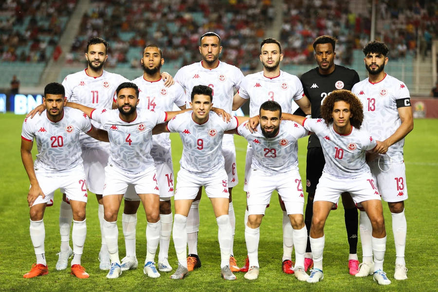 Tunisia National Football Team Players In White Jersey Wallpaper