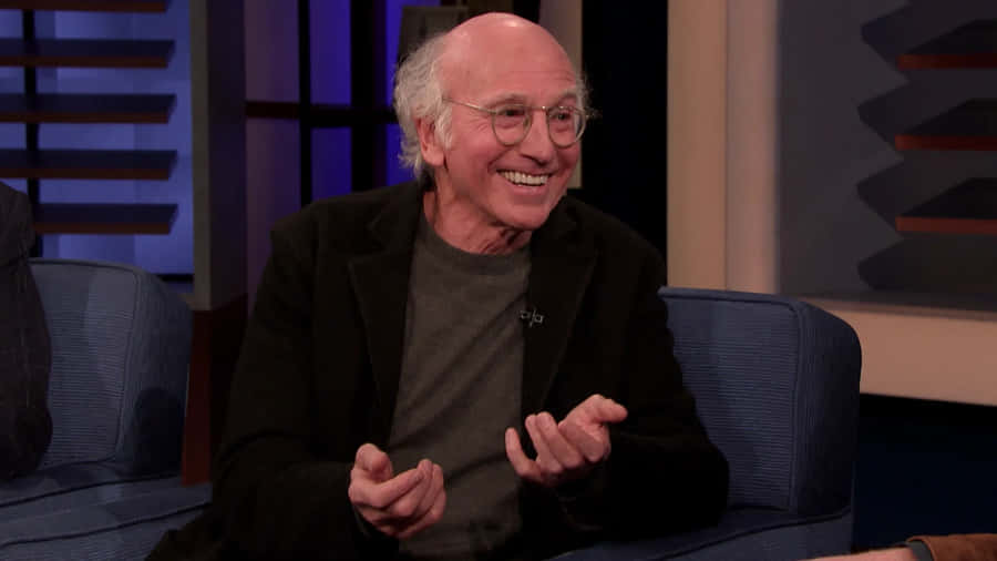 Tv Industry Icon Larry David In Thought Wallpaper