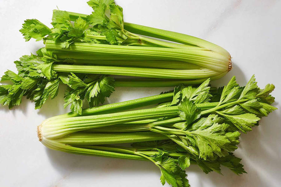 Twin Celery On White Tabletop Wallpaper