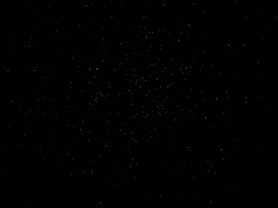 Twinkling Stars On Blank Black Sky Wallpaper