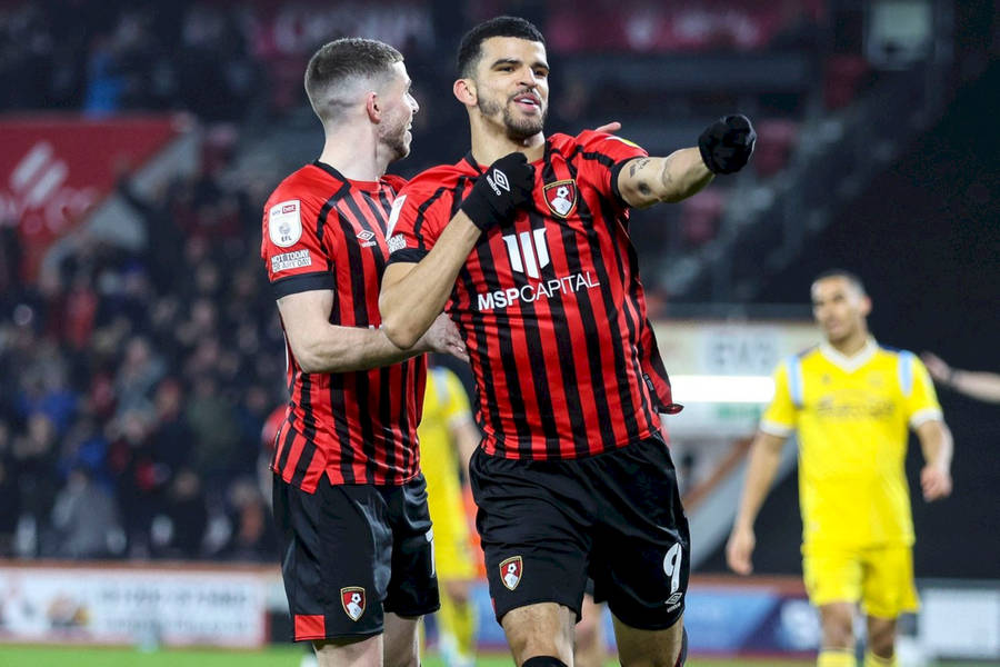 Two Afc Bournemouth Players On Field Wallpaper