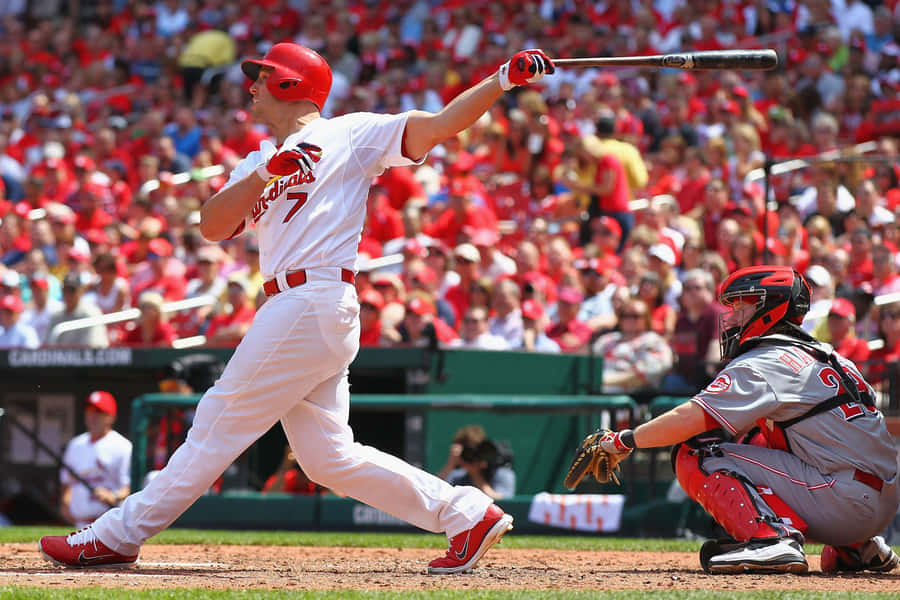 Two Baseball Players In Mid-action Wallpaper