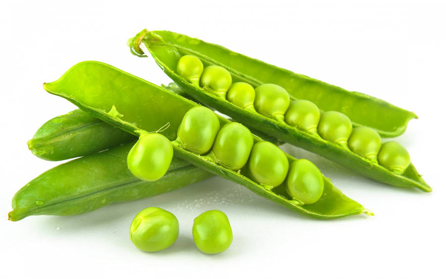 Two Open Vegetable Green Peas Pods Wallpaper