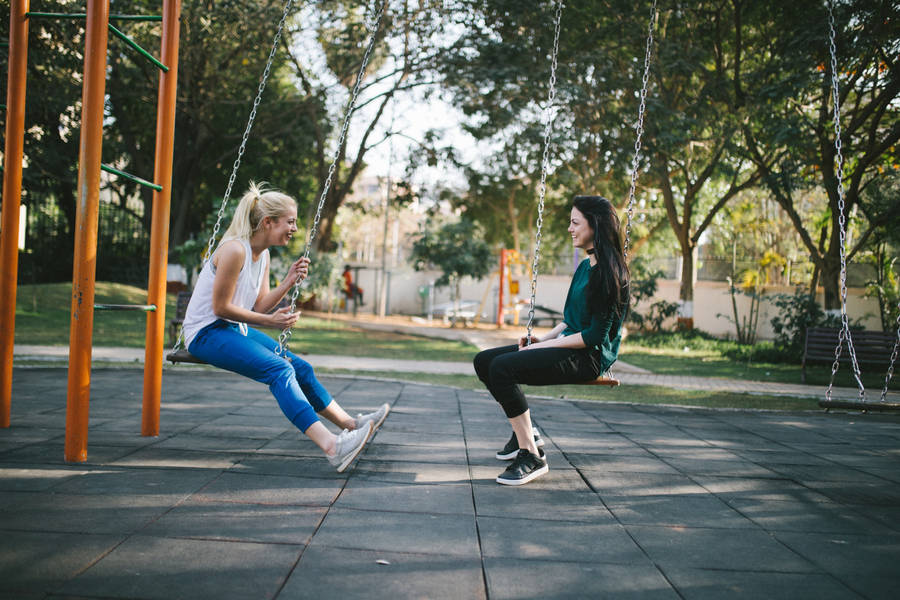 Two Teenage Girls At The Swing Wallpaper