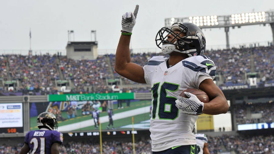 Tyler Lockett Football Player Seattle Seahawks Crowd Wallpaper