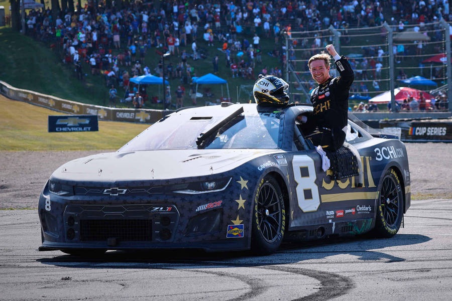 Tyler Reddick Sitting On The Window Wallpaper