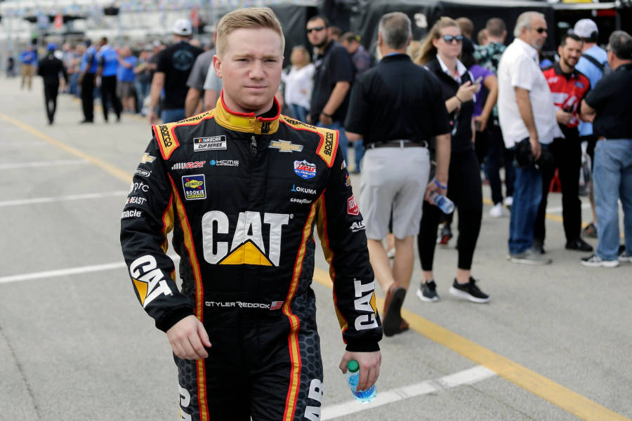 Tyler Reddick Walking In Overalls Wallpaper