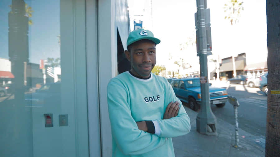 Tyler The Creator At Desk Wallpaper