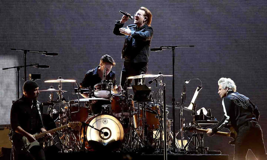 U2 Band Performance On Stage Wallpaper